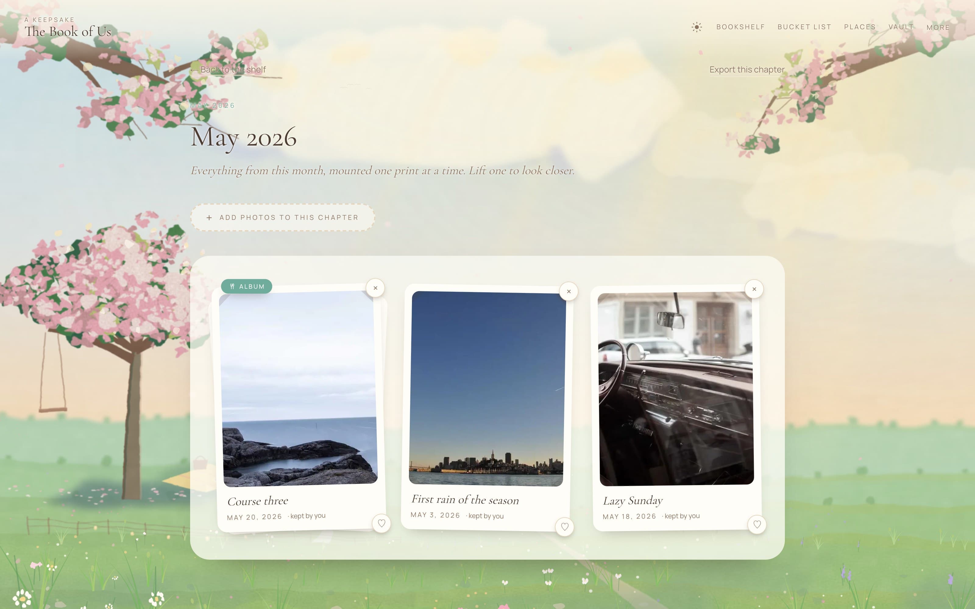 A chapter page in Book of Us: “May 2026” over the painted daytime world, with three mounted photo prints — Course three, First rain of the season, and Lazy Sunday — each dated and marked “kept by you”. The first carries an ALBUM tag.